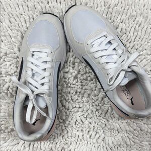 White and Gray Sneakers with Black Accents